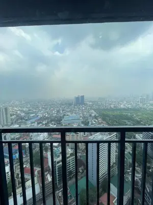 a view of a city from the top of a building at Affordable Staycation Home in Makati in Manila