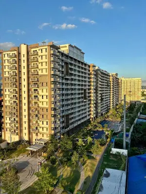 an aerial view of a city with tall buildings at Metro Zen at DMCI Satori Residence 1br in Manila
