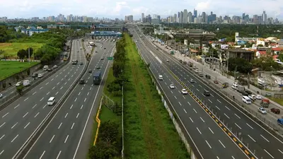 an aerial view of a highway in a city at Harrison Suites in Manila