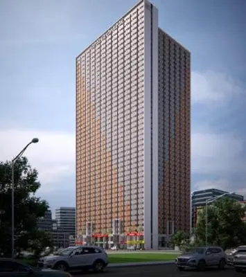 a tall building with cars parked in front of it at CUBAO Macks Awesome Place NETFLIX UNLIFAST WIFI in Manila