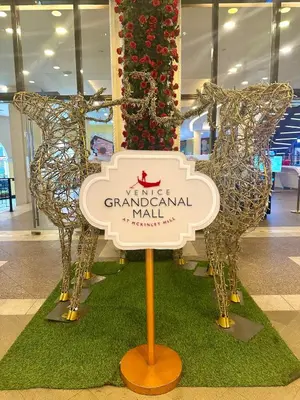 a sign for a grandadian mall in a shopping mall at Exquisite Japandi 2 & Mediterranean Breeze at Venice w Grand Canal View! in Manila