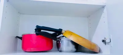 a knife sitting on top of a pot at Avida sm sucat condotel in Manila