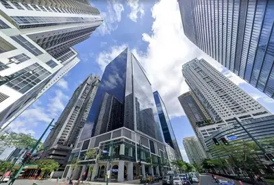 a view of a city with tall buildings at Plant Box Apartment in Manila