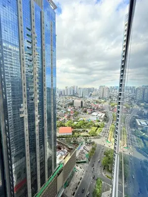 a view of a city from a skyscraper at Relaxing and Comfy in Manila