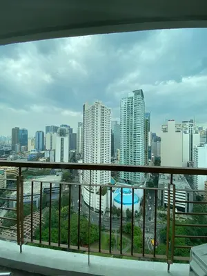 a view of a city skyline from a balcony at Prime Location and Affordable Studio Condo in Legaspi Village, Makati with City view in Manila