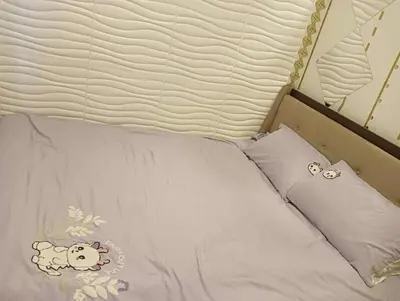 a bed with two hello kitty pillows on it at la Chicka - 295 T3 in Manila