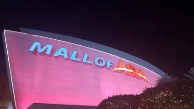 a sign for a mall of america at night at Shell Residence in Manila