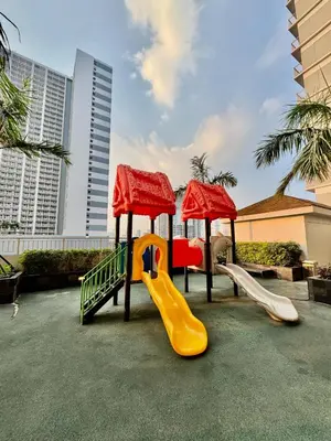 a playground with two slides and a slideintend at Mitch Ace Staycation in Manila