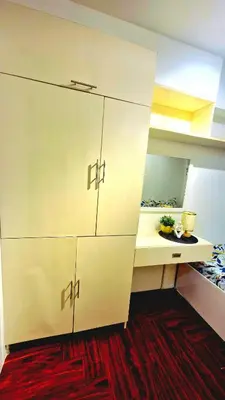 a room with a desk and a white cabinet at 1BR with Netflix, Prime & KTV in Manila