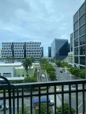 a view of a city with buildings and a street at Cozy Couple Room in Manila