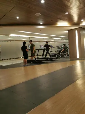 a group of people working out in a gym at Mall of Asia condotel shore 3 tower 2 in Manila
