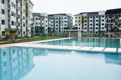 a large swimming pool in front of some buildings at Enchanted Home - Near Enchanted Kingdom in Santa Rosa