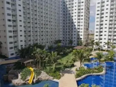 a view of a resort with a water park at 2br Beach KTV Condo in MOA SMX Okada, Near Airport in Manila