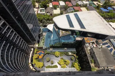 an overhead view of a building with a garden at 1 Bedroom Loft in Gramercy Residences Makati in Manila