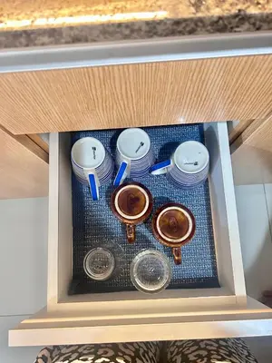 a drawer with four different clocks in it at staycation near manila airport across NAIA terminal 3,13 min drive to terminal 2 and 1, Vexy Condotel located at 101 newport manila in Manila