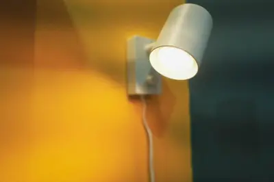 a white light is attached to a wall at 1 Bedroom Unit at Venice Luxury Residences in Manila