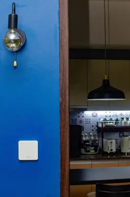 a blue wall in a kitchen with a counter at 1 Bedroom Unit at Venice Luxury Residences in Manila