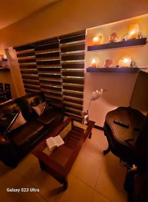 a living room with a couch and a coffee table at 2BR FREE PARKING Calathea Place in Manila