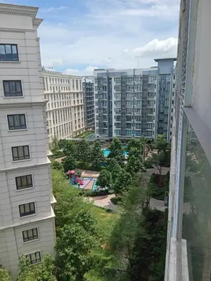 a view from a window of a building at M&N Condotel in Manila