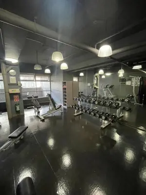 a gym with a lot of treadmills and machines at A Venue Residences 2403 in Makati