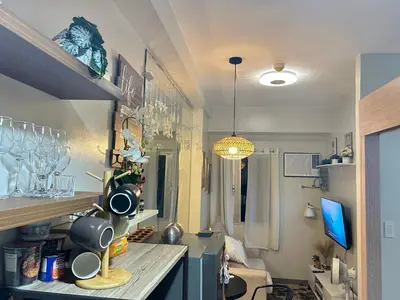 a kitchen with a counter top in a room at The Minimal Getaway in Manila