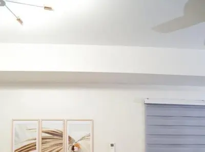 a room with a white ceiling and a window at Awsome Corner Unit at Shore 3 in Manila