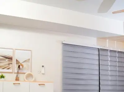 a large blue garage door in a room at Awsome Corner Unit at Shore 3 in Manila