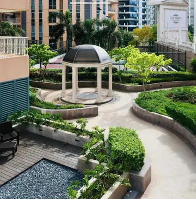 a garden with a gazebo in a city at Premium 1BR suite Modern Filipino at BGC w balcony in Manila