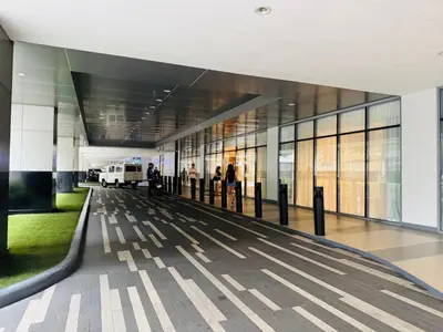 an airport terminal with people waiting for their flights at MOA Newly Turn Over 1 bedroom with balcony PRIER Place in Manila