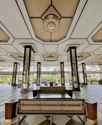 a large building with a large room with aasteryasteryasteryasteryasteryasteryastery at The Intramuros Family Suite in Manila