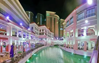 a shopping mall with a river in the middle at Morgan Suite Studio a7 next to VeniceCanal Mall Wi-fi in Manila