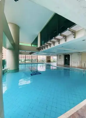 a large swimming pool in a large building at Seaview in Malate in Manila