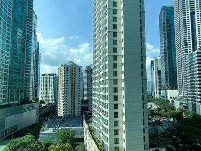 an aerial view of a city with tall buildings at Budget City View w Pool Access in BGC Taguig City in Manila
