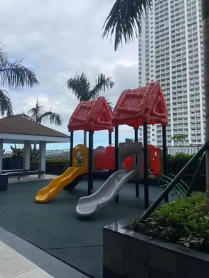 a playground with a slide at FX Property 3950 in Manila