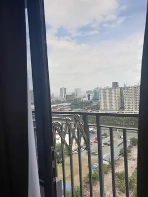 a view of a city from a balcony at Shore 2 tower 2 in Manila