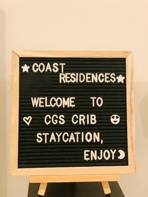 a chalkboard sign with the words coast resilience and welcome to css css at CGS Crib staycation in Manila