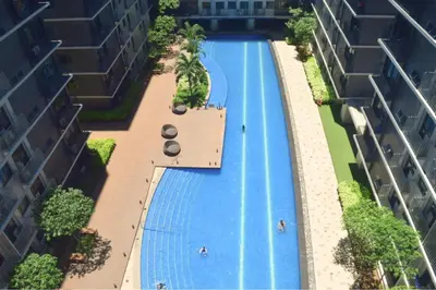 an overhead view of a swimming pool in a building at Shore Staycation at Shore 3 Mall of Asia in Manila