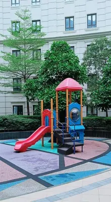 a playground with a slide in front of a building at Budget Stay Across NAIA Terminal 3 C2-2L in Manila