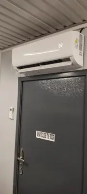 a sticker on a door with a microwave on top at 6 Guest - Unit 5 Studio type with balcony in Santa Rosa