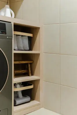 a kitchen with a pantry with a microwave at Eastwood City 1BR Muji Home Luxe Minimalist Fast WiFi in Manila