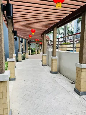 a building hallway with red lights and a walk way at Studio Unit in One Palm Tree Villas across NAIA Terminal 3 in Manila