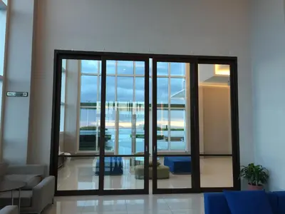a view of a living room with a glass door at Studio Unit at The Beacon Makati in Manila