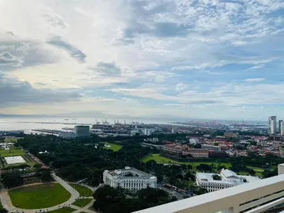 a view of a city from the top of a building at Torre De Manila taft Tan38 in Manila