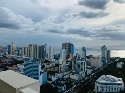 a view of a city with skyscrapers at Torre De Manila taft Tan38 in Manila