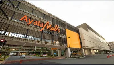 a large building with a walmart sign on it at Sy bay in Manila