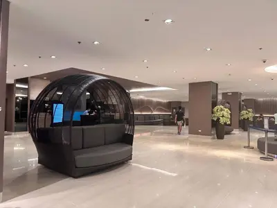 a lobby with a circular object in the middle at Mango Room near MOA STARCITY 2 Beds in Manila