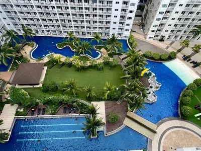 an aerial view of a resort with a swimming pool at Shore residences A 1br Near SM MOA in Manila