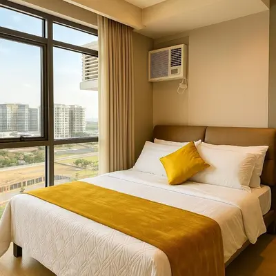 a bedroom with a large bed with a large window at Modern & Luxury 1BR near Okada, Solaire, Airport in Manila