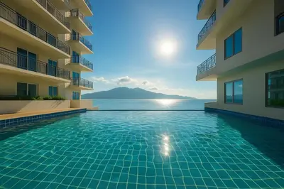 a swimming pool in the middle of a building at Modern & Cozy 6BR near Okada, Solaire, Airport in Manila