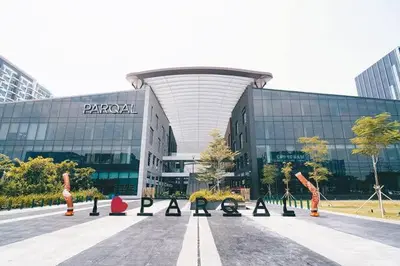 a parking lot in front of a large building at Sybaysuites staycation near Okada COD MOA NAIA airport Solaire MSV1808H in Manila